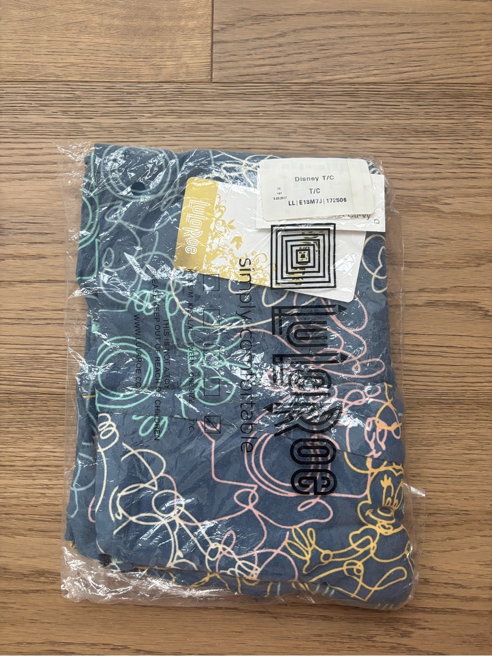 LuLaRoe Navy Leggings with Pastel Swirl Sketch Print